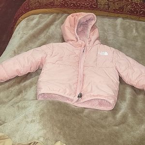 Slightly used north face toddler girl coat. Size 6-12 month.